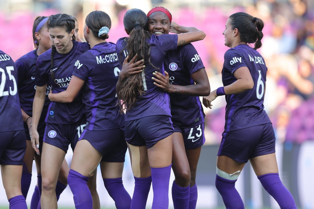 Apr 2, 2023; Orlando, Florida, USA; Orlando Pride forward Messiah Bright (23) celebrates a goal with teammates in the second half against Angel City FC at Exploria Stadium. Mandatory Credit: Cory Knowlton-USA TODAY Sports