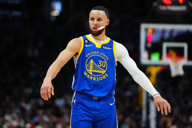 Apr 2, 2023; Denver, Colorado, USA; Golden State Warriors guard Stephen Curry (30) during the second half against the Denver Nuggets at Ball Arena. Mandatory Credit: Ron Chenoy-USA TODAY Sports