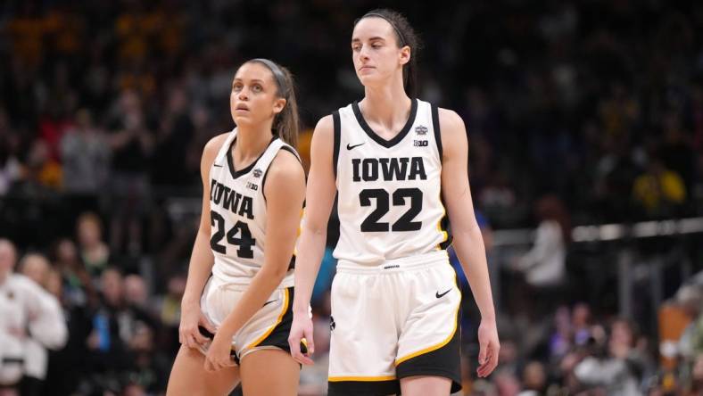 Apr 2, 2023; Dallas, TX, USA; Iowa Hawkeyes guard Gabbie Marshall (24) and guard Caitlin Clark (22) react during the NCAA Womens Basketball Final Four National Championship against the LSU Lady Tigers at American Airlines Center. Mandatory Credit: Kirby Lee-USA TODAY Sports