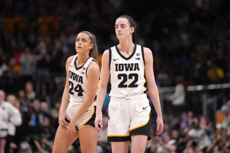 Apr 2, 2023; Dallas, TX, USA; Iowa Hawkeyes guard Gabbie Marshall (24) and guard Caitlin Clark (22) react during the NCAA Womens Basketball Final Four National Championship against the LSU Lady Tigers at American Airlines Center. Mandatory Credit: Kirby Lee-USA TODAY Sports