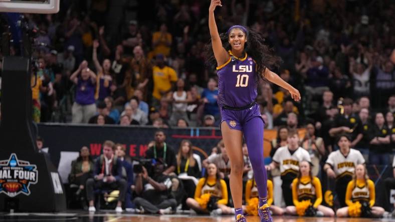 Apr 2, 2023; Dallas, TX, USA; LSU Lady Tigers forward Angel Reese (10) celebrates during the NCAA Womens Basketball Final Four National Championship against the Iowa Hawkeyes at American Airlines Center. Mandatory Credit: Kirby Lee-USA TODAY Sports