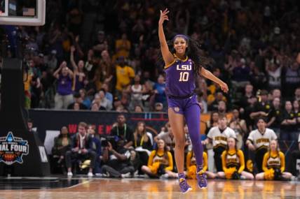 Apr 2, 2023; Dallas, TX, USA; LSU Lady Tigers forward Angel Reese (10) celebrates during the NCAA Womens Basketball Final Four National Championship against the Iowa Hawkeyes at American Airlines Center. Mandatory Credit: Kirby Lee-USA TODAY Sports