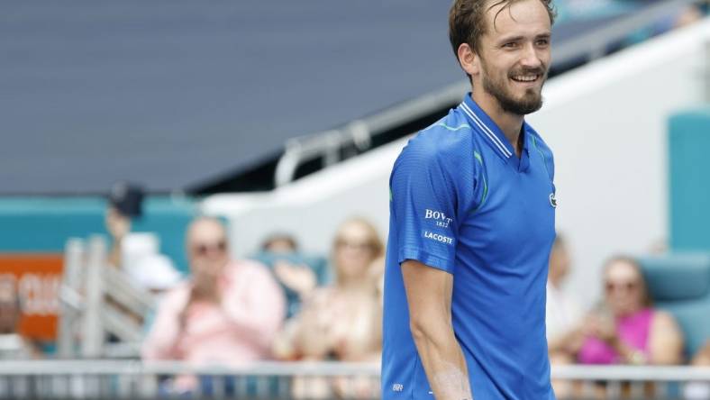 Apr 2, 2023; Miami, Florida, US; Daniil Medvedev smiles after match point against Jannik Sinner (ITA) (not pictured) in the men's singles final on day fourteen of the Miami Open at Hard Rock Stadium. Mandatory Credit: Geoff Burke-USA TODAY Sports