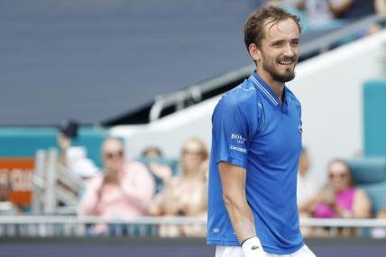 Apr 2, 2023; Miami, Florida, US; Daniil Medvedev smiles after match point against Jannik Sinner (ITA) (not pictured) in the men's singles final on day fourteen of the Miami Open at Hard Rock Stadium. Mandatory Credit: Geoff Burke-USA TODAY Sports