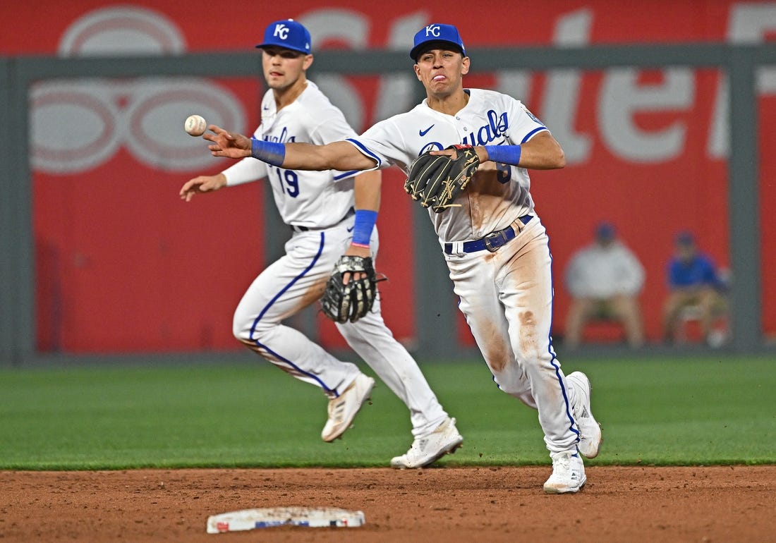 Singer, Lopez lead Royals past Blue Jays 9-5 for 1st win