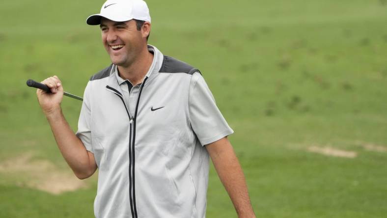 Apr 3, 2023; Augusta, Georgia, USA; Scottie Scheffler laughs at the practice facility during a practice round for The Masters golf tournament at Augusta National Golf Club. Mandatory Credit: Danielle Parhizkaran-USA TODAY Network

Pga The Masters Practice Round