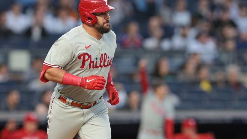 Apr 4, 2023; Bronx, New York, USA; Philadelphia Phillies left fielder Kyle Schwarber (12) runs the bases after hitting a solo home run during the first inning against the New York Yankees at Yankee Stadium. Mandatory Credit: Vincent Carchietta-USA TODAY Sports