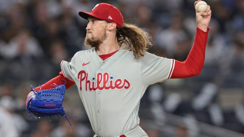 Apr 4, 2023; Bronx, New York, USA; Philadelphia Phillies relief pitcher Matt Strahm (25) delivers a pitch during the second inning against the New York Yankees at Yankee Stadium. Mandatory Credit: Vincent Carchietta-USA TODAY Sports