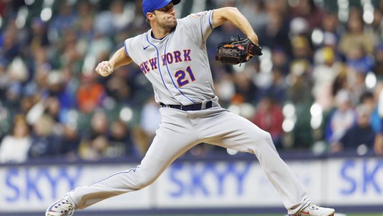 Apr 4, 2023; Milwaukee, Wisconsin, USA;  New York Mets pitcher Max Scherzer (21) throws a pitch during the second inning against the Milwaukee Brewers at American Family Field. Mandatory Credit: Jeff Hanisch-USA TODAY Sports