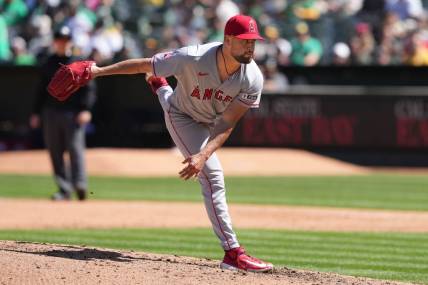 Apr 1, 2023; Oakland, California, USA; Los Angeles Angels starting pitcher Patrick Sandoval (43) throws a pitch against the Oakland Athletics during the fifth inning at RingCentral Coliseum. Mandatory Credit: Darren Yamashita-USA TODAY Sports