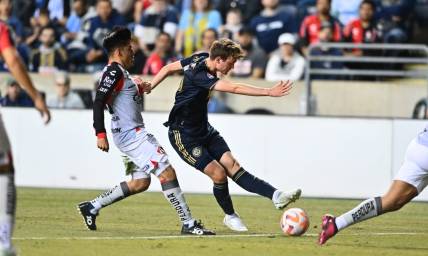 Apr 4, 2023; Chester, PA, USA; Philadelphia Union midfielder Jack McGlynn (16) passes the ball against Atlas FC in the first half at Subaru Park. Mandatory Credit: Kyle Ross-USA TODAY Sports