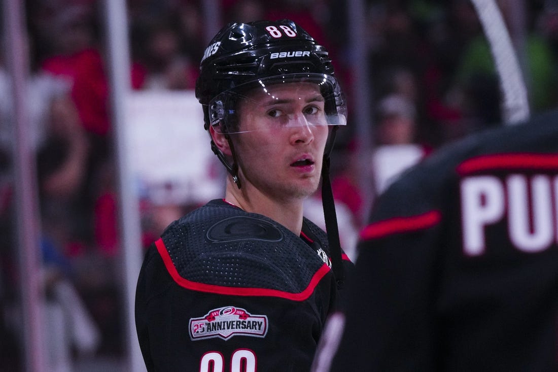 Apr 4, 2023; Raleigh, North Carolina, USA;  Carolina Hurricanes center Martin Necas (88) looks on before the game during the warmups against the Ottawa Senators at PNC Arena. Mandatory Credit: James Guillory-USA TODAY Sports