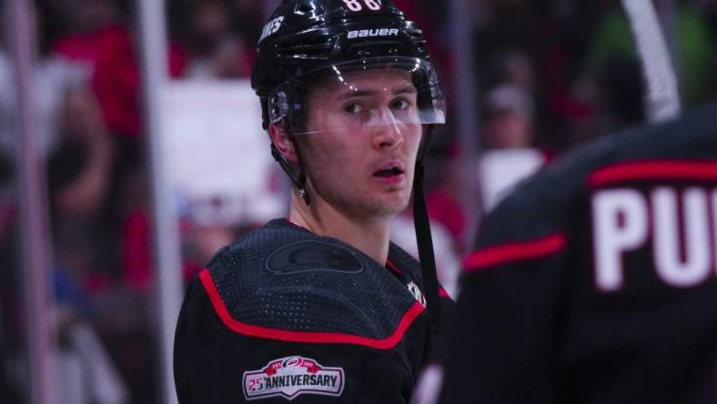 Apr 4, 2023; Raleigh, North Carolina, USA;  Carolina Hurricanes center Martin Necas (88) looks on before the game during the warmups against the Ottawa Senators at PNC Arena. Mandatory Credit: James Guillory-USA TODAY Sports