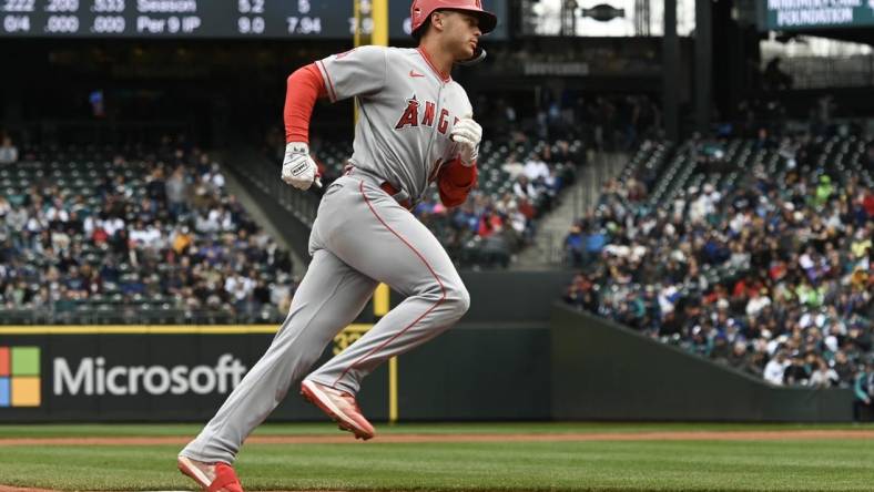 Apr 5, 2023; Seattle, Washington, USA; Los Angeles Angels catcher Logan O'Hoppe (14) runs around third base after hitting a two-run home run against the Seattle Mariners during the second inning at T-Mobile Park. Mandatory Credit: Michael Thomas Shroyer-USA TODAY Sports