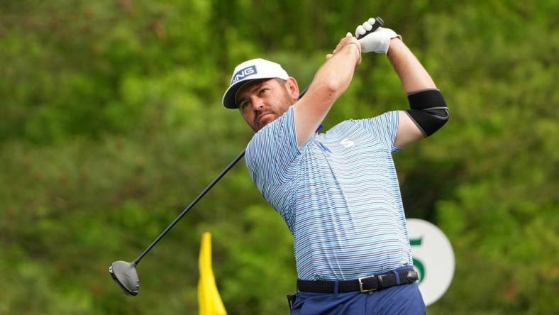 Apr 6, 2023; Augusta, Georgia, USA; Louis Oosthuizen tees off on the fifth hole during the first round of The Masters golf tournament. Mandatory Credit: Kyle Terada-USA TODAY Network