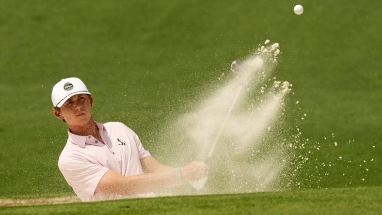 Apr 6, 2023; Augusta, Georgia, USA; Gordon Sargent plays a shot from a bunker on the second hole during the first round of The Masters golf tournament. Mandatory Credit: Michael Madrid-USA TODAY Network