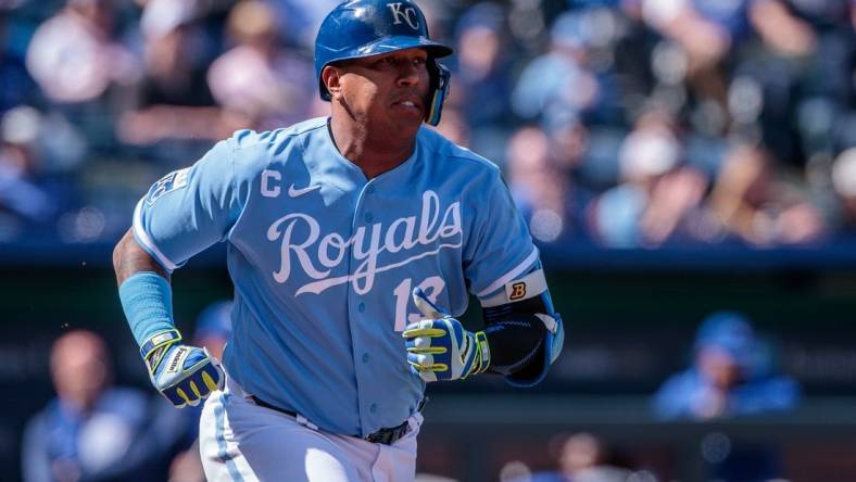 Apr 6, 2023; Kansas City, Missouri, USA; Kansas City Royals catcher Salvador Perez (13) heads to first base after a hit during the eighth inning against the Toronto Blue Jays at Kauffman Stadium. Mandatory Credit: William Purnell-USA TODAY Sports