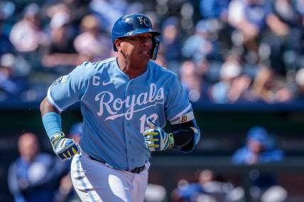 Apr 6, 2023; Kansas City, Missouri, USA; Kansas City Royals catcher Salvador Perez (13) heads to first base after a hit during the eighth inning against the Toronto Blue Jays at Kauffman Stadium. Mandatory Credit: William Purnell-USA TODAY Sports