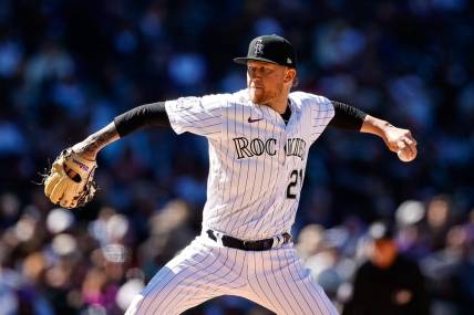 Apr 6, 2023; Denver, Colorado, USA; Colorado Rockies starting pitcher Kyle Freeland (21) pitches in the fifth inning against the Washington Nationals at Coors Field. Mandatory Credit: Isaiah J. Downing-USA TODAY Sports