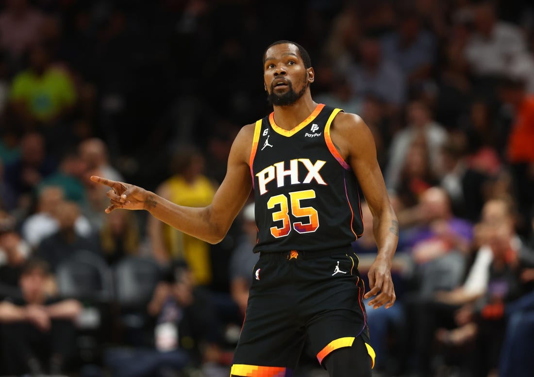 Apr 6, 2023; Phoenix, Arizona, USA; Phoenix Suns forward Kevin Durant (35) celebrates a shot against the Denver Nuggets in the first half at Footprint Center. Mandatory Credit: Mark J. Rebilas-USA TODAY Sports