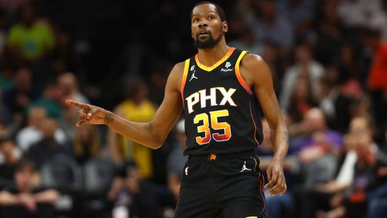 Apr 6, 2023; Phoenix, Arizona, USA; Phoenix Suns forward Kevin Durant (35) celebrates a shot against the Denver Nuggets in the first half at Footprint Center. Mandatory Credit: Mark J. Rebilas-USA TODAY Sports