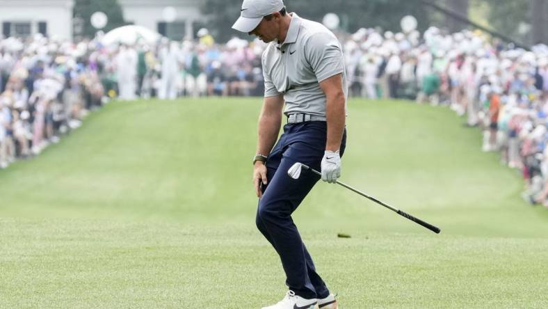 Apr 7, 2023; Augusta, Georgia, USA; Rory McIlroy reacts to his shot after hitting from the first fairway during the second round of The Masters golf tournament. Mandatory Credit: Rob Schumacher-USA TODAY Network