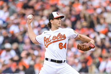Apr 7, 2023; Baltimore, Maryland, USA;  Baltimore Orioles starting pitcher Dean Kremer (64) delivers a first inning pitch against the New York Yankees at Oriole Park at Camden Yards. Mandatory Credit: Tommy Gilligan-USA TODAY Sports