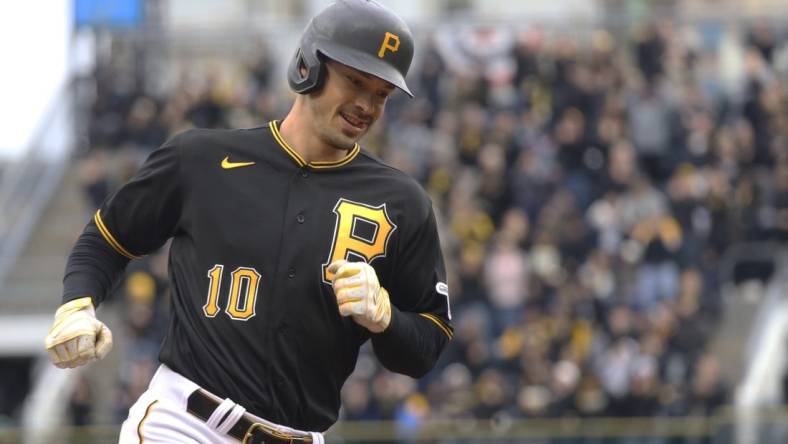 Apr 7, 2023; Pittsburgh, Pennsylvania, USA;  Pittsburgh Pirates left fielder Bryan Reynolds (10) circles the bases on a three run home run against the Chicago White Sox during the fourth inning at PNC Park. Mandatory Credit: Charles LeClaire-USA TODAY Sports