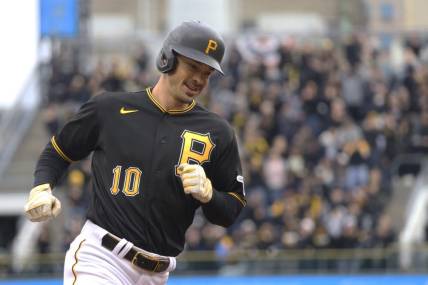 Apr 7, 2023; Pittsburgh, Pennsylvania, USA;  Pittsburgh Pirates left fielder Bryan Reynolds (10) circles the bases on a three run home run against the Chicago White Sox during the fourth inning at PNC Park. Mandatory Credit: Charles LeClaire-USA TODAY Sports