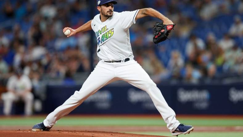 Apr 7, 2023; St. Petersburg, Florida, USA;  Tampa Bay Rays starting pitcher Zach Eflin (24) throws a pitch against the Oakland Athletics in the first inning at Tropicana Field. Mandatory Credit: Nathan Ray Seebeck-USA TODAY Sports