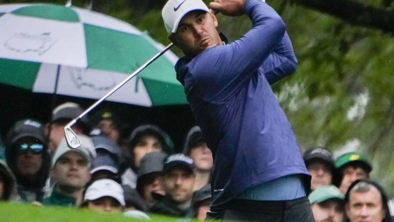 Apr 8, 2023; Augusta, Georgia, USA; Brooks Koepka tees off on the fourth hole during the third round of The Masters golf tournament. Mandatory Credit: Danielle Parhizkaran-USA TODAY Network