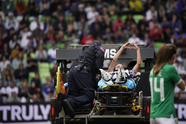 Apr 8, 2023; Austin, Texas, USA; U.S. Women's National Team forward Mallory Swanson (9) is escorted off field by medical personnel during the first half in a match against the Republic of Ireland Women's National Team at Q2 Stadium. Mandatory Credit: Dustin Safranek-USA TODAY Sports