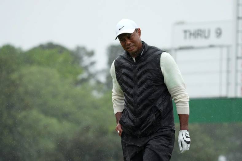 Apr 8, 2023; Augusta, Georgia, USA; Tiger Woods walks to the 18th green during the second round of The Masters golf tournament. Mandatory Credit: Kyle Terada-USA TODAY Network
