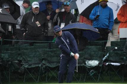 Apr 8, 2023; Augusta, Georgia, USA; Zach Johnson chips onto the 18th green during the third round of The Masters golf tournament. Mandatory Credit: Kyle Terada-USA TODAY Network