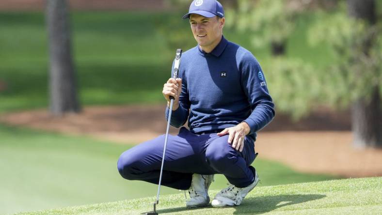 Apr 9, 2023; Augusta, Georgia, USA; Jordan Spieth lines up his putt on the seventh green during the final round of The Masters golf tournament. Mandatory Credit: Danielle Parhizkaran-USA TODAY Network