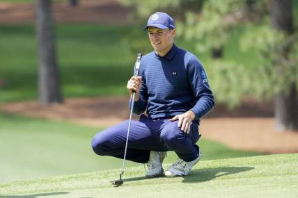 Apr 9, 2023; Augusta, Georgia, USA; Jordan Spieth lines up his putt on the seventh green during the final round of The Masters golf tournament. Mandatory Credit: Danielle Parhizkaran-USA TODAY Network