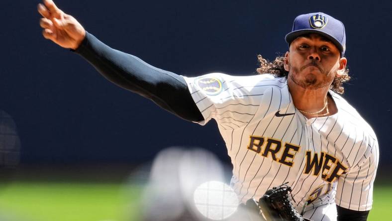 Apr 9, 2023; Milwaukee, Wisconsin, USA;  Milwaukee Brewers starting pitcher Freddy Peralta (51) throws during the first inning of their game against the St. Louis Cardinals at American Family Field. Mandatory Credit: Mark Hoffman-USA TODAY Sports