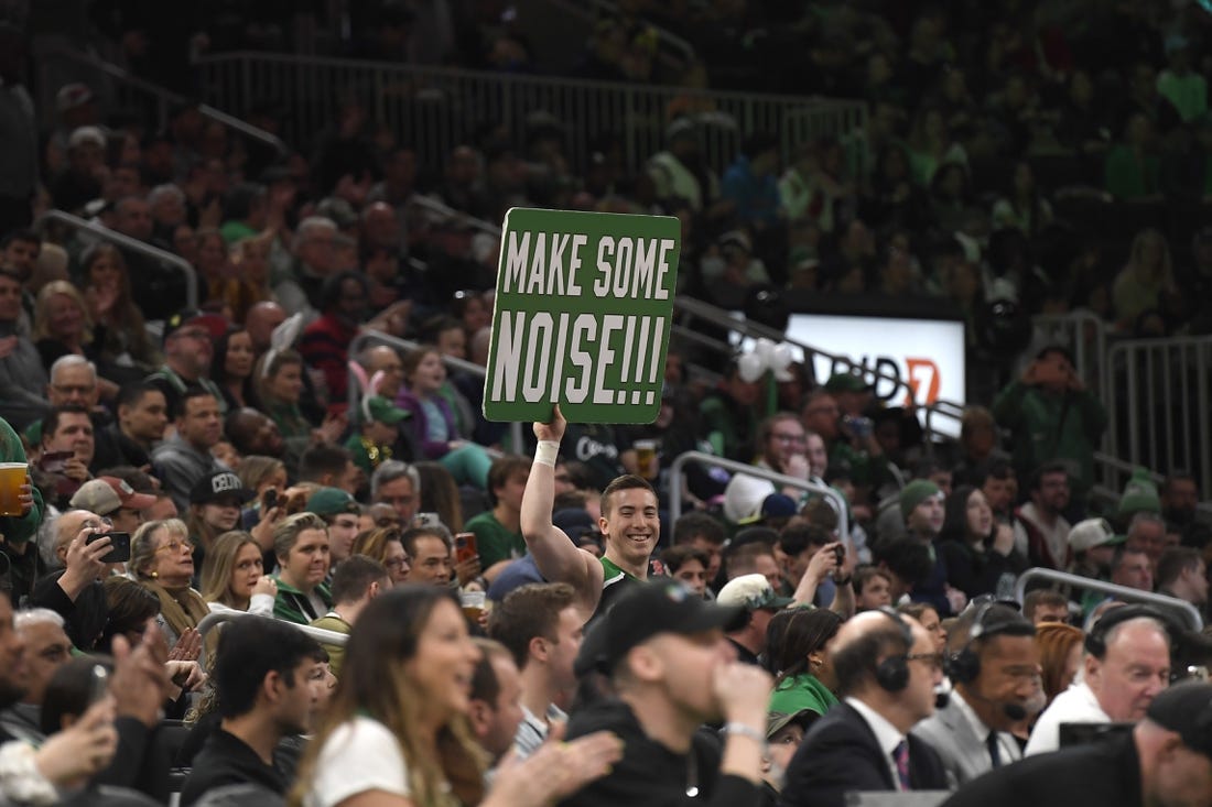 Apr 9, 2023; Boston, Massachusetts, USA; A fan holds a sign during the first half at TD Garden. Mandatory Credit: Bob DeChiara-USA TODAY Sports