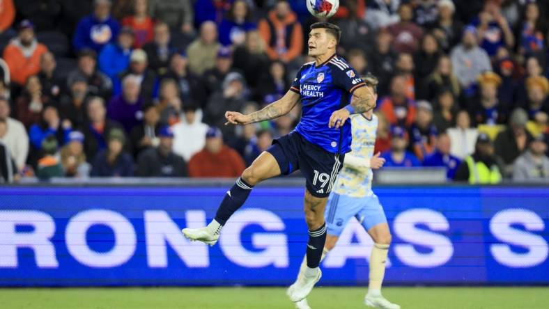 Apr 8, 2023; Cincinnati, Ohio, USA;  FC Cincinnati forward Brandon Vazquez (19) heads the ball against the Philadelphia Union at TQL Stadium. Mandatory Credit: Aaron Doster-USA TODAY Sports