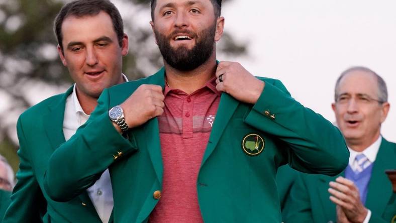 Scottie Scheffler (left) helps Jon Rahm into his green jacket after Rahm's Masters win.

Pga Masters Tournament Final Round