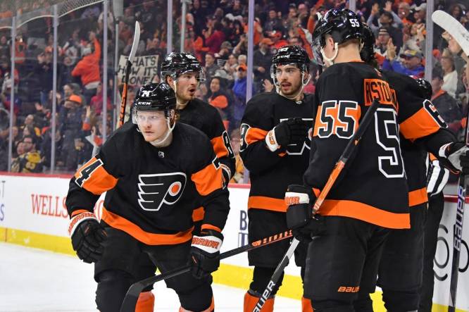 Apr 9, 2023; Philadelphia, Pennsylvania, USA; Philadelphia Flyers right wing Owen Tippett (74) heads back to the bench after scoring a goal against the Boston Bruins during the third period at Wells Fargo Center. Mandatory Credit: Eric Hartline-USA TODAY Sports