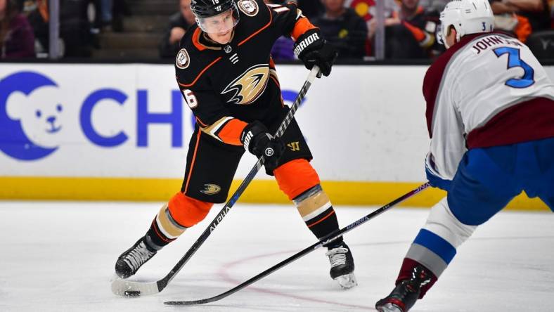 Apr 9, 2023; Anaheim, California, USA; Anaheim Ducks center Ryan Strome (16) shoots on goal against the defense of Colorado Avalanche defenseman Jack Johnson (3) during the second period at Honda Center. Mandatory Credit: Gary A. Vasquez-USA TODAY Sports