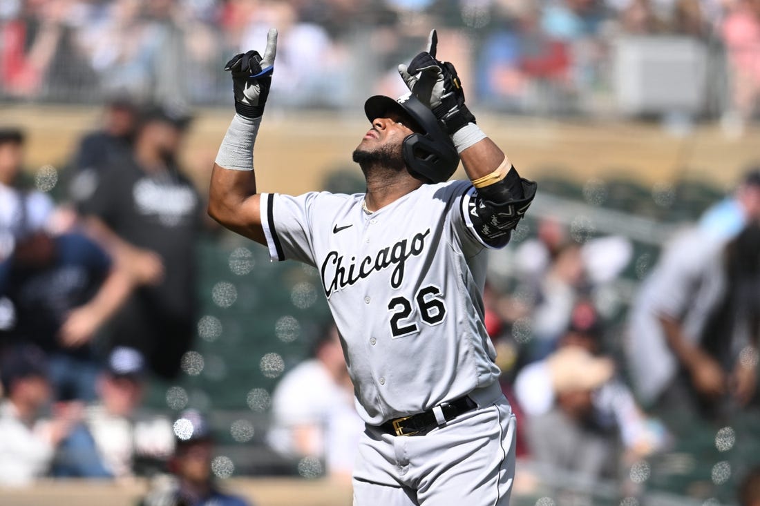 Apr 10, 2023; Minneapolis, Minnesota, USA; Chicago White Sox shortstop Hanser Alberto (26) reacts after hitting a three run home run against Minnesota Twins starting pitcher Kenta Maeda (not pictured) during the fourth inning at Target Field. Mandatory Credit: Jeffrey Becker-USA TODAY Sports