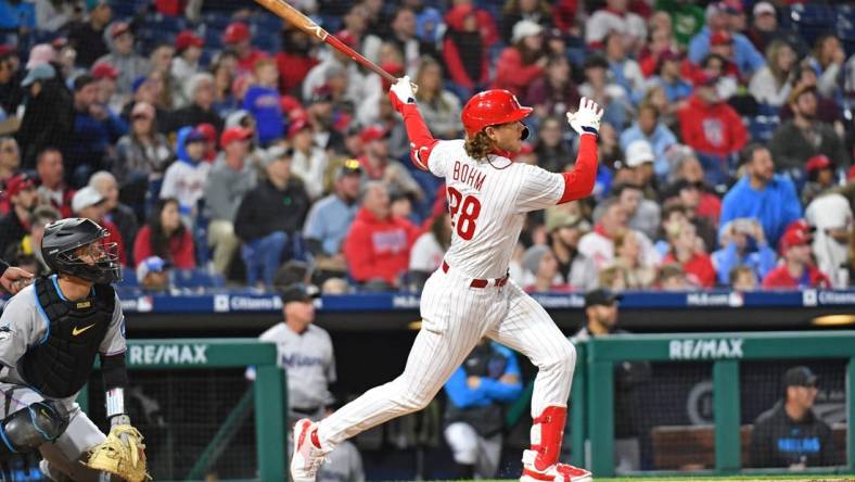 Apr 10, 2023; Philadelphia, Pennsylvania, USA; Philadelphia Phillies third baseman Alec Bohm (28) watches his three run home run against the Miami Marlins during the sixth inning at Citizens Bank Park. Mandatory Credit: Eric Hartline-USA TODAY Sports