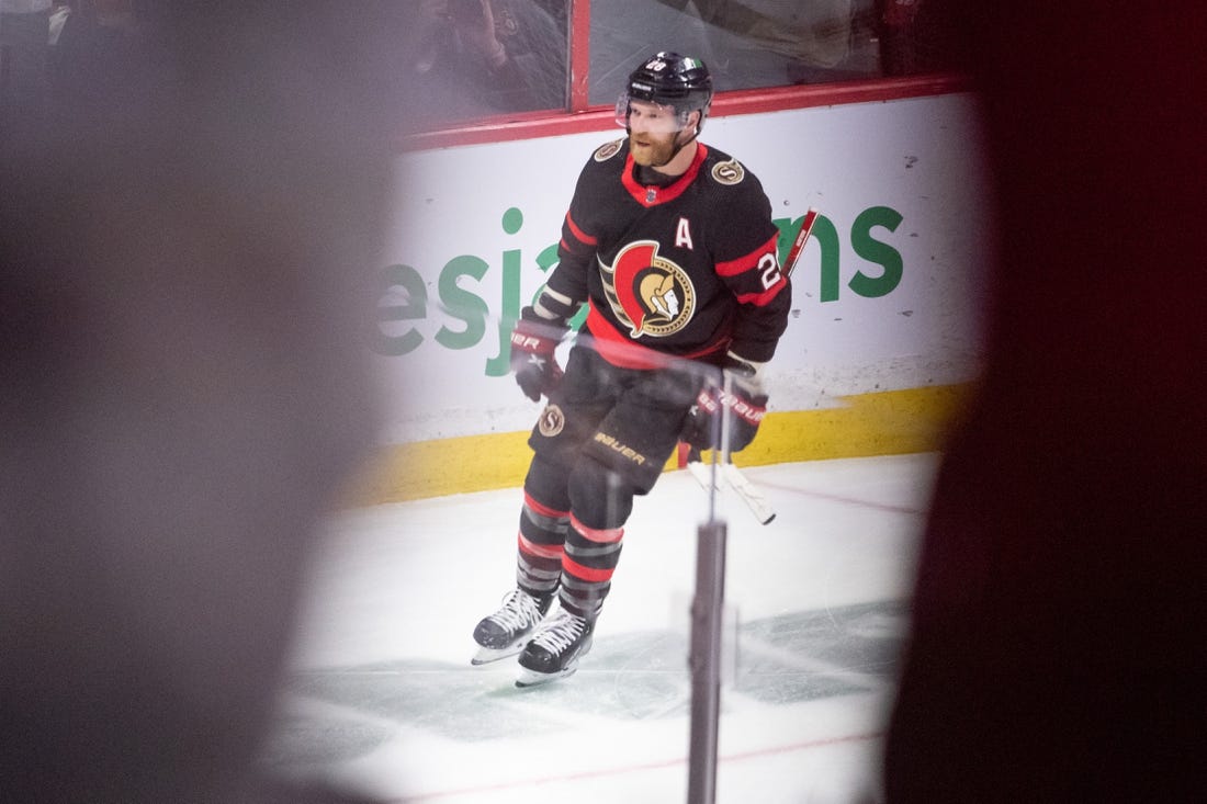 Apr 10, 2023; Ottawa, Ontario, CAN; Ottawa Senators right wing Claude Giroux (28) scores his second goal of the night in the third period against the Carolina Hurricanes at the Canadian Tire Centre. Mandatory Credit: Marc DesRosiers-USA TODAY Sports