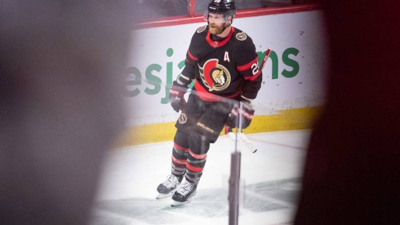 Apr 10, 2023; Ottawa, Ontario, CAN; Ottawa Senators right wing Claude Giroux (28) scores his second goal of the night in the third period against the Carolina Hurricanes at the Canadian Tire Centre. Mandatory Credit: Marc DesRosiers-USA TODAY Sports