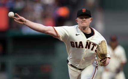 Apr 10, 2023; San Francisco, California, USA; San Francisco Giants starting pitcher Logan Webb (62) delivers a pitch against the Los Angeles Dodgers during the first inning at Oracle Park. Mandatory Credit: D. Ross Cameron-USA TODAY Sports