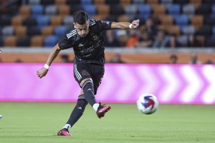 Apr 8, 2023; Houston, Texas, USA; Houston Dynamo FC midfielder Amine Bassi (8) in action during the match against the LA Galaxy at Shell Energy Stadium. Mandatory Credit: Troy Taormina-USA TODAY Sports