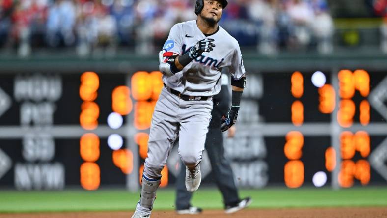 Apr 11, 2023; Philadelphia, Pennsylvania, USA; Miami Marlins second baseman Luis Arraez (3) advances to third after hitting a triple against the Philadelphia Phillies in the sixth inning at Citizens Bank Park. Mandatory Credit: Kyle Ross-USA TODAY Sports