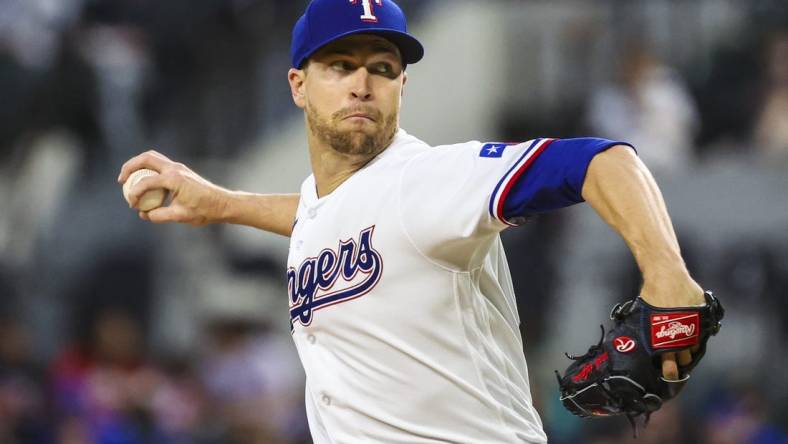 Apr 11, 2023; Arlington, Texas, USA;  Texas Rangers starting pitcher Jacob deGrom (48) throws during the fourth inning against the Kansas City Royals at Globe Life Field. Mandatory Credit: Kevin Jairaj-USA TODAY Sports